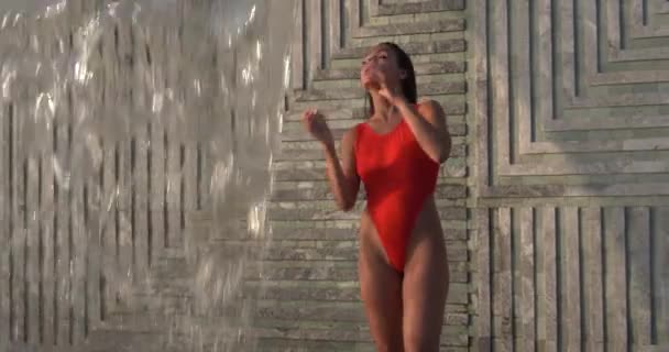 Beautiful Brunette Woman Red Swimsuit Posing Outdoor Pool Wall Waterfall — Stock Video