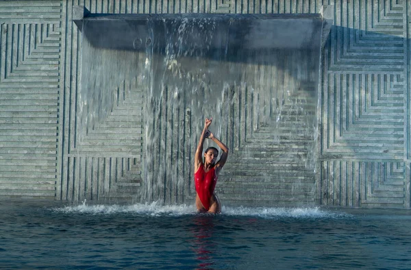 Beautiful Brunette Woman Red Swimsuit Posing Outdoor Pool Wall Waterfall — Stock Photo, Image