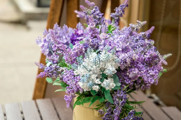 lavender bouquet in wooden vase