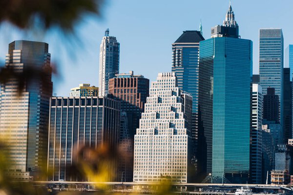 NEW YORK - 20 DECEMBER, 2016: View of Lower Manhattan Skyscrapers in the Financial District seen from the Promenade in Brooklyn Heights