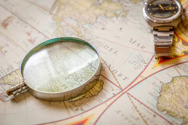 magnifier glass and map