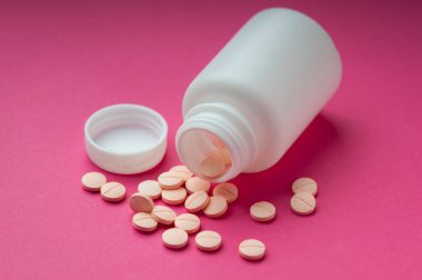 Tıbbi uygulamalarda, broşürlerde, sunumlarda ve yayınlarda grafik tasarımında kullanılacak renk haplarının arka planı. pembe renk