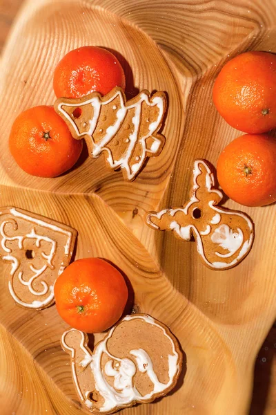 Christmas cookies and tangerines — Stock Photo, Image