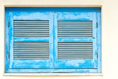Mavi ahşap pencere kepenkleri. Bali, Crete