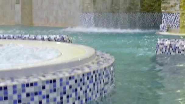 Jacuzzi among swimming pool with SPA — Stock Video