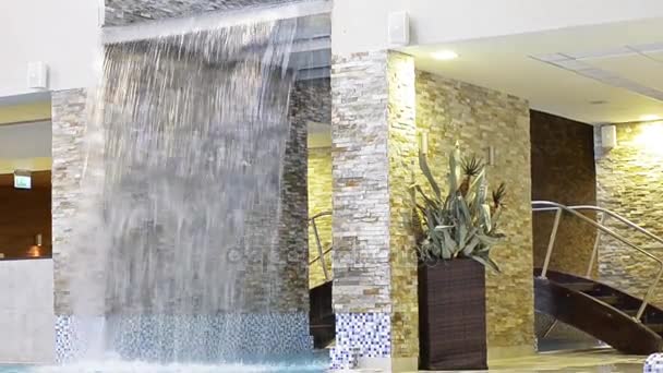 Decorative waterfall - water falls down — Stock Video