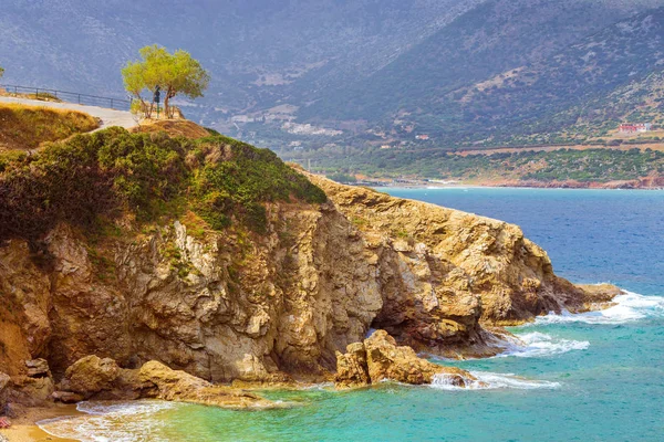 Waves break on rocky shore. Bali, Crete — Stock Photo, Image