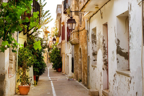 Rethymno Greece Crete. Walk around the old resort town Rethymno in Greece. Architecture and Mediterranean attractions on island Crete. Narrow touristic street in the tourist routes
