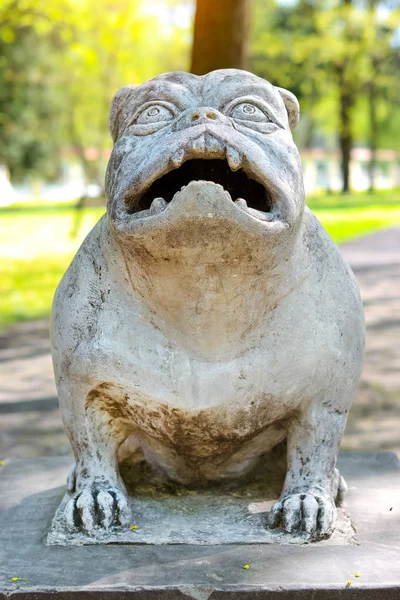 Sculpture dog monster in Park of Branicki Palace