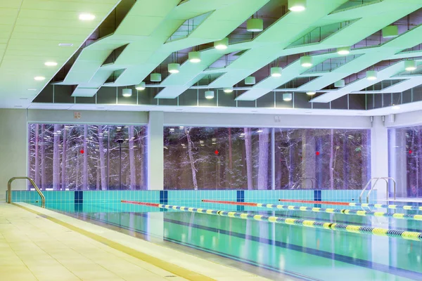 Lap pool with marked lanes. Empty swimming pool