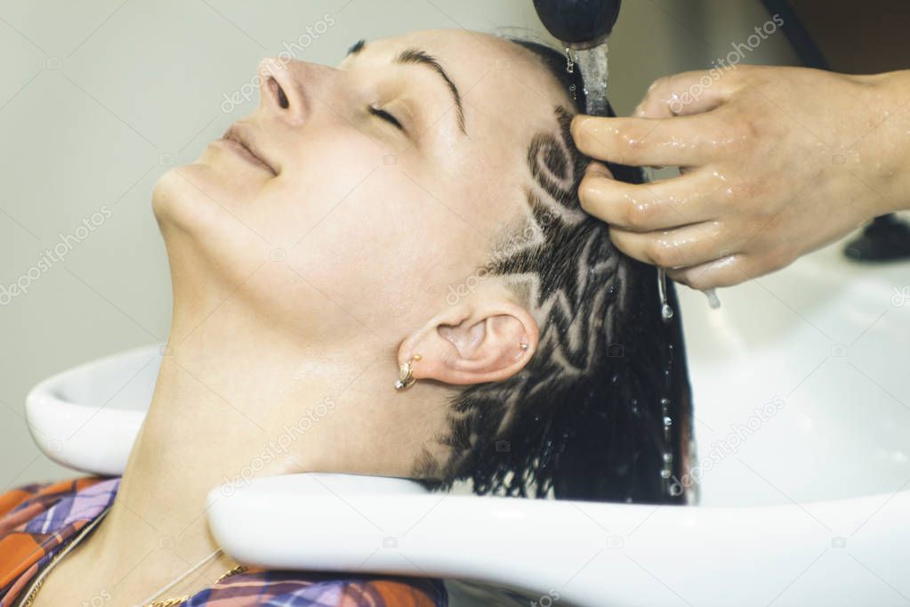 Shampoo in salon woman