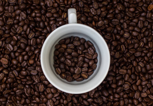 Coffee beans in a cup,cup of coffee with beans