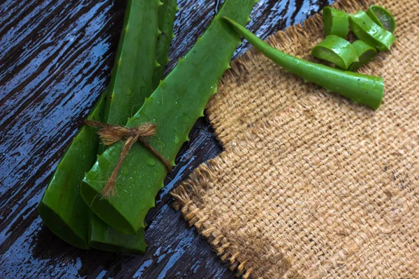 Aloevera fresh leaf on the wooden.Space for text — Stock Photo, Image