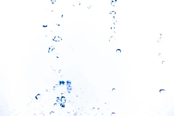 Брызги воды на белом фоне — стоковое фото