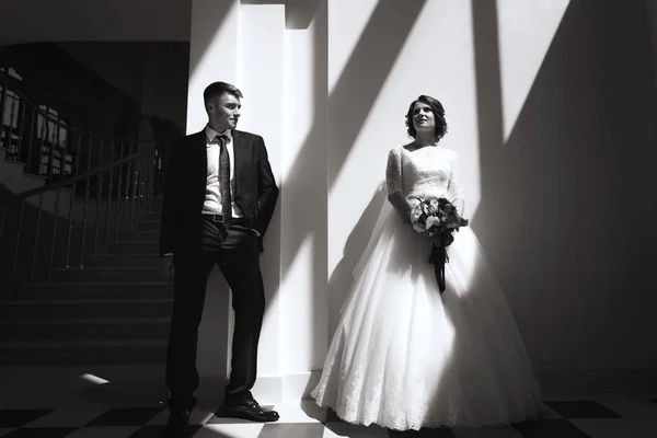 monochrome portrait of bride and groom