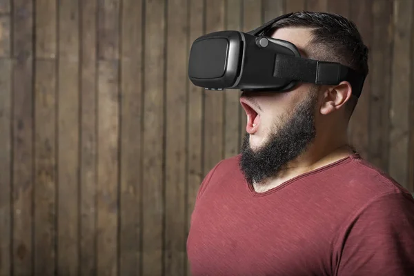 Frightened man with vr. Virtual reality glasses