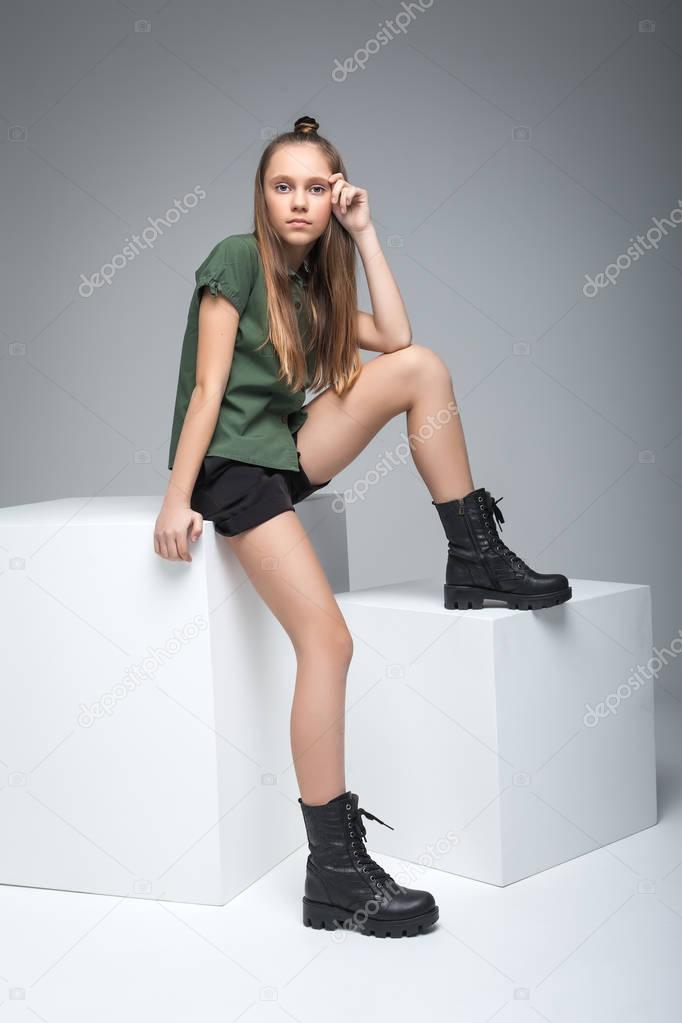 Young cute model girl with cube