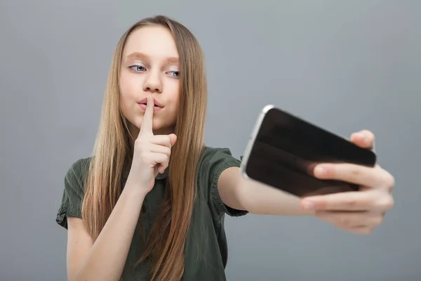 Cute girl taking selfie and show gesture finger — Stock Photo, Image