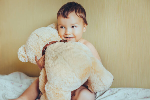 nice baby with teddy bear