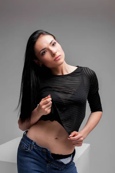 Beautiful model standing in studio — Stock Photo, Image
