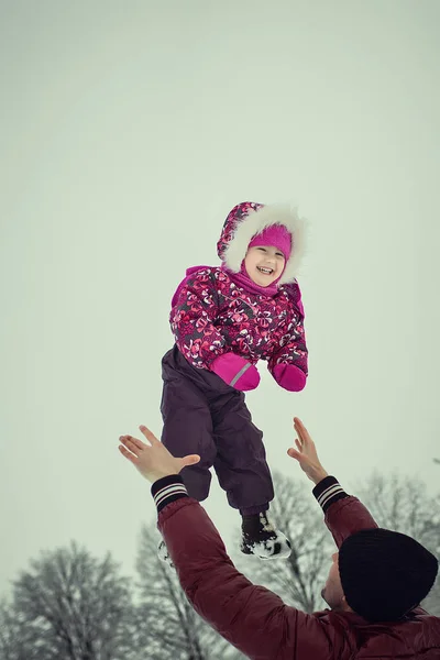 stock image dad with daughter playing time in winter park