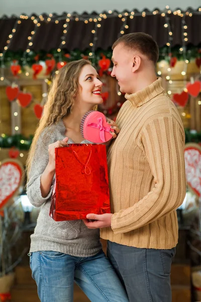 Man making surprise to his woman on valentines day — Stock Photo, Image