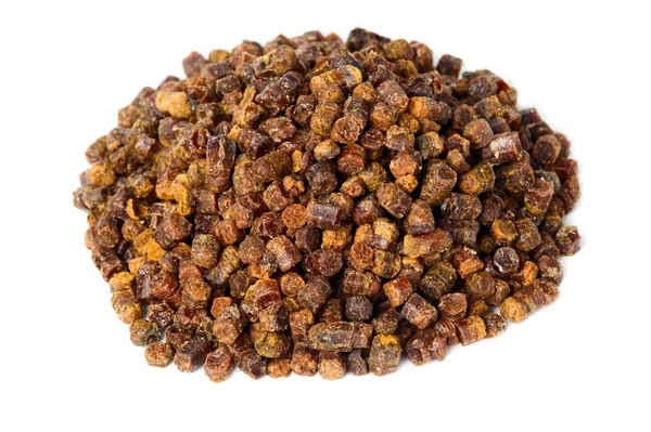 Propolis korrels geïsoleerd op een witte achtergrond, bee product — Stockfoto