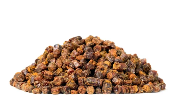 Propolis granulés isolés sur fond blanc, produit apicole — Photo