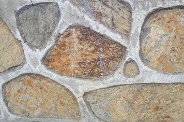 Eski taş duvar. Rough Taşlar farklı şekiller. Taş arka plan.