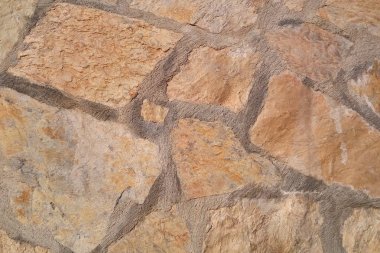 Eski taş duvar. Rough Taşlar farklı şekiller. Taş arka plan.