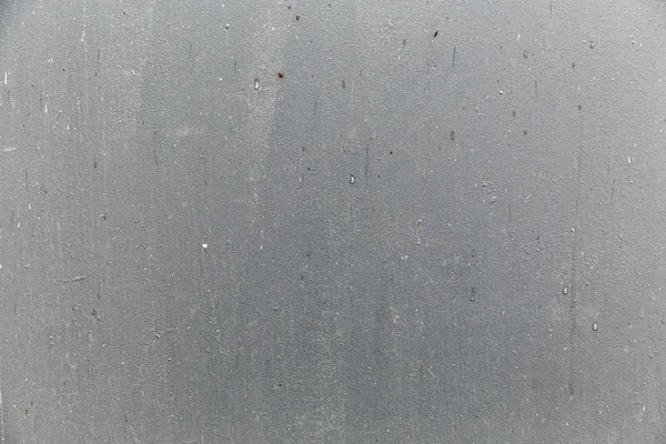 Текстура пофарбованих металевих дверей з плямами та штрихами пензля . — стокове фото