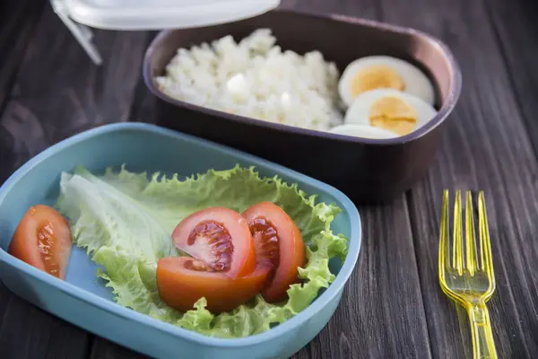 Healthy food in the container - vegetables, rice, eggs — Stock Photo, Image