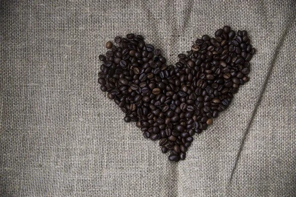 Kahve çuval bezi üzerinde arka plan - Sevgililer Günü'nde aşk — Stok fotoğraf