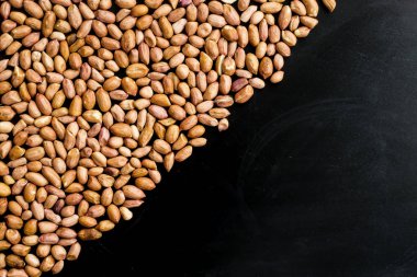 Fıstık proteinler ve yağlar dolu. Diyet ve sağlıklı bir yaşam tarzı. Üstten Görünüm