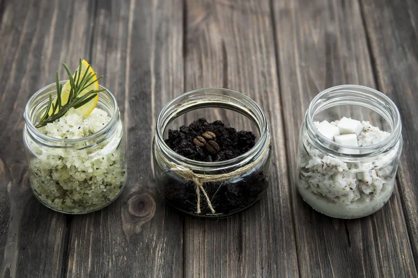 Homemade scrubs in jars - coffee, lemon, rosemary, and coconut. spa treatment — Stock Photo, Image