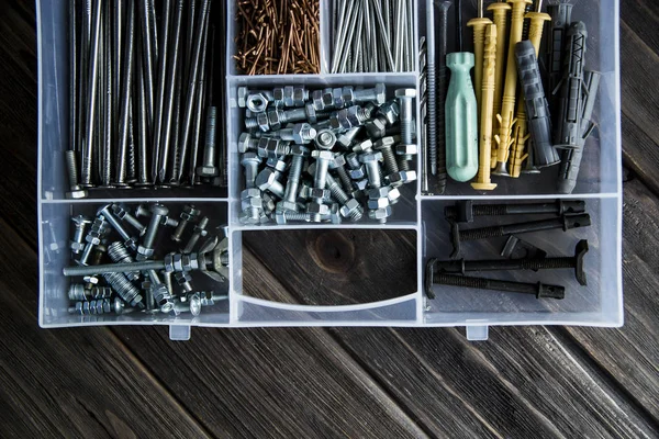 Bolts, nuts, nails and screws for the home master — Stock Photo, Image