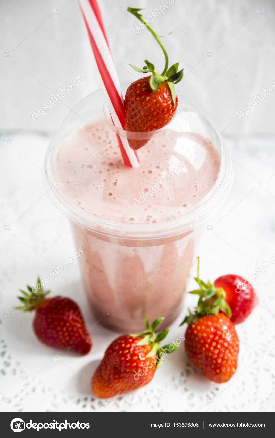 Healthy summer smoothies to go in a plastic cup Stock Photo by ©Vsamarkina  153576806