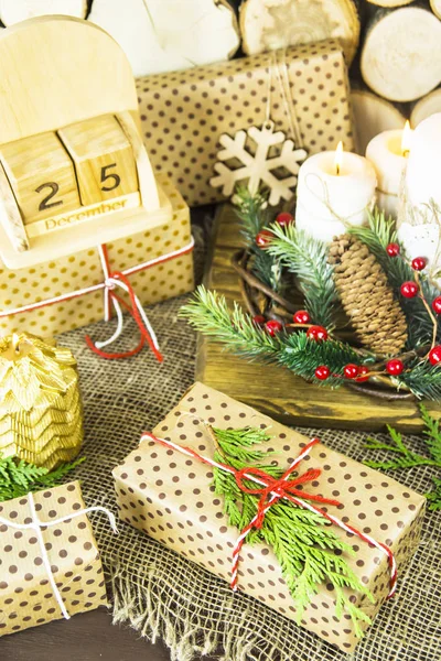 Presents for the Christmas concept - a gift wrapped and decorated by December 25 — Stock Photo, Image