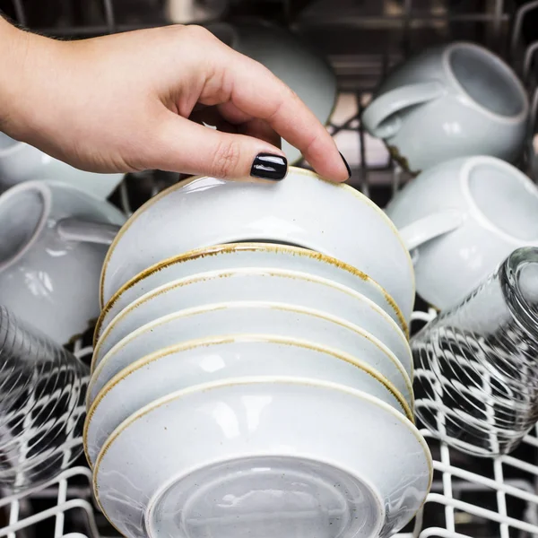 Woman Hand Takes Clean Saucer Out Dishwasher Home Equipment Cleaning — Stock Photo, Image