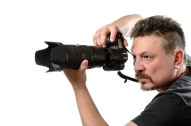 portre fotoğrafçısı izole bir arka plan üzerinde bir kamera ile