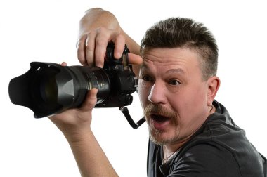 portre fotoğrafçısı izole bir arka plan üzerinde bir kamera ile