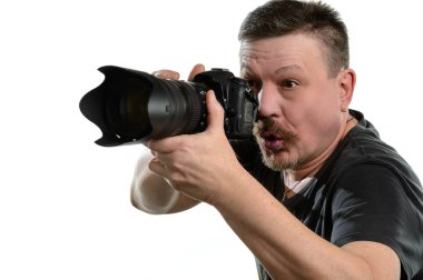 portre fotoğrafçısı izole bir arka plan üzerinde bir kamera ile