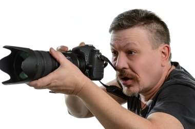 portre fotoğrafçısı izole bir arka plan üzerinde bir kamera ile