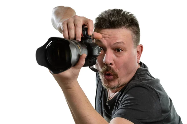 portre fotoğrafçısı izole bir arka plan üzerinde bir kamera ile