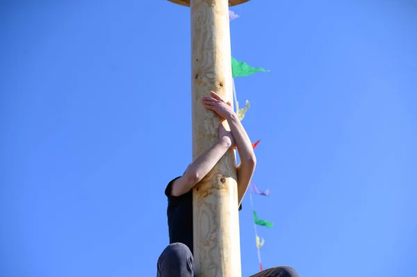 Teenager Trying Climb Smooth Wooden Pole Maslenitsa Festival Russia Russian — Stock Photo, Image