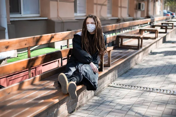 Girl Dreadlocks Protective Mask Her Face Sits Benches Public Place — Stock Photo, Image