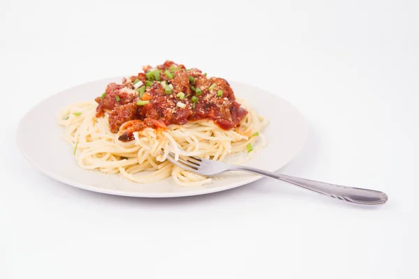 Massa comida com um garfo — Fotografia de Stock