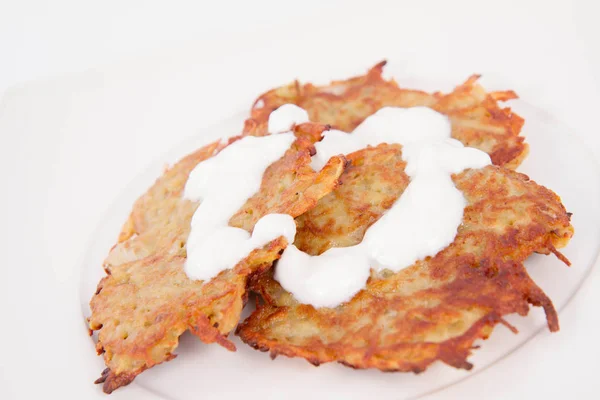 Potato Pancakes with cream — Stock Photo, Image
