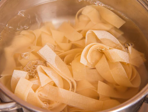 Pasta being cooked — Stock Photo, Image