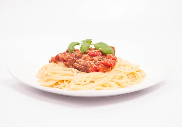 Spaghetti bolognese on white — Stock Photo, Image